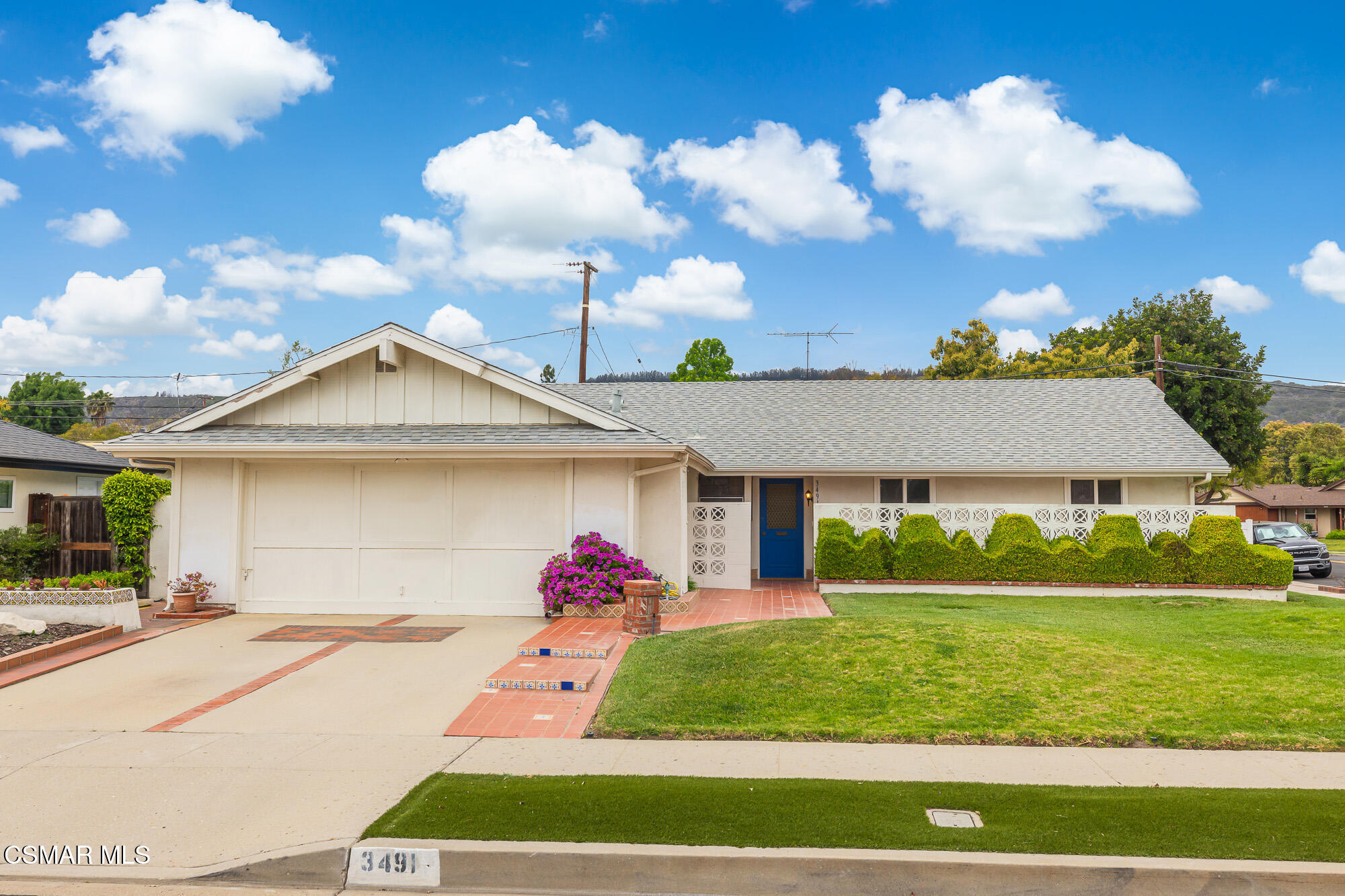 3491 Rivermore Street Camarillo, CA 93010 - Photo 4 of 49 a front view of a house with garden