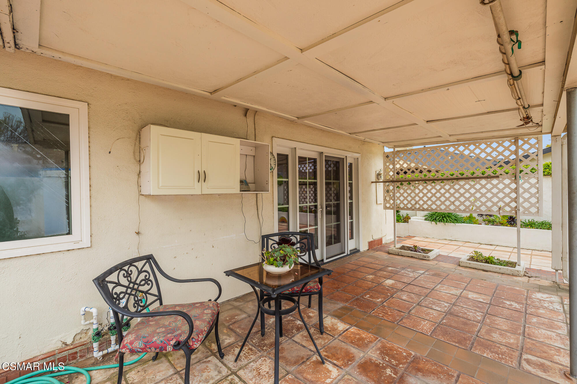 3491 Rivermore Street Camarillo, CA 93010 - Photo 45 of 49 a view of a patio with a table and chairs