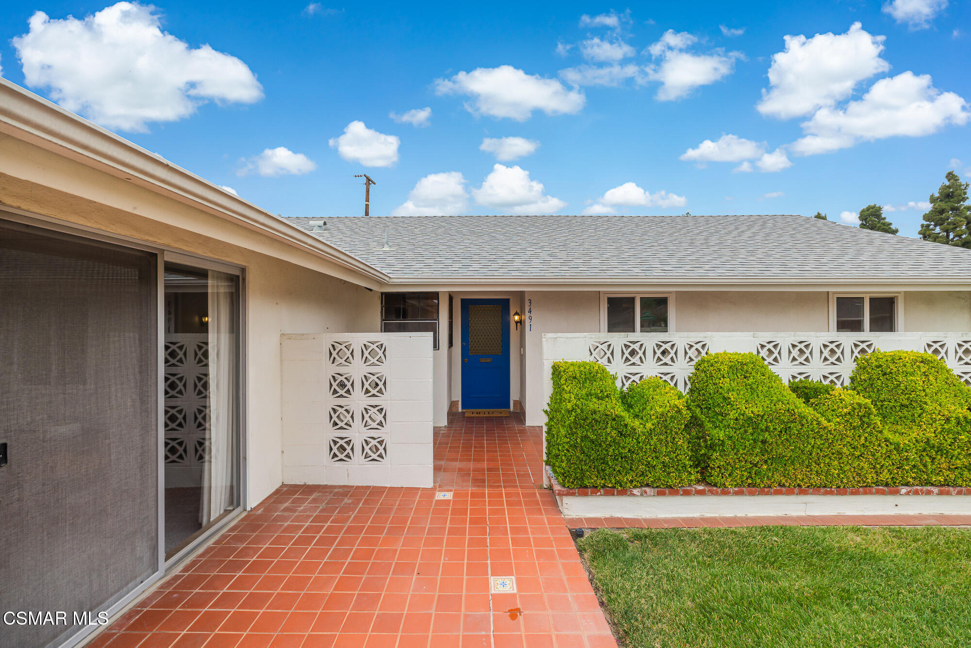 3491 Rivermore Street Camarillo, CA 93010 - Photo 5 of 49 a front view of a house with garden