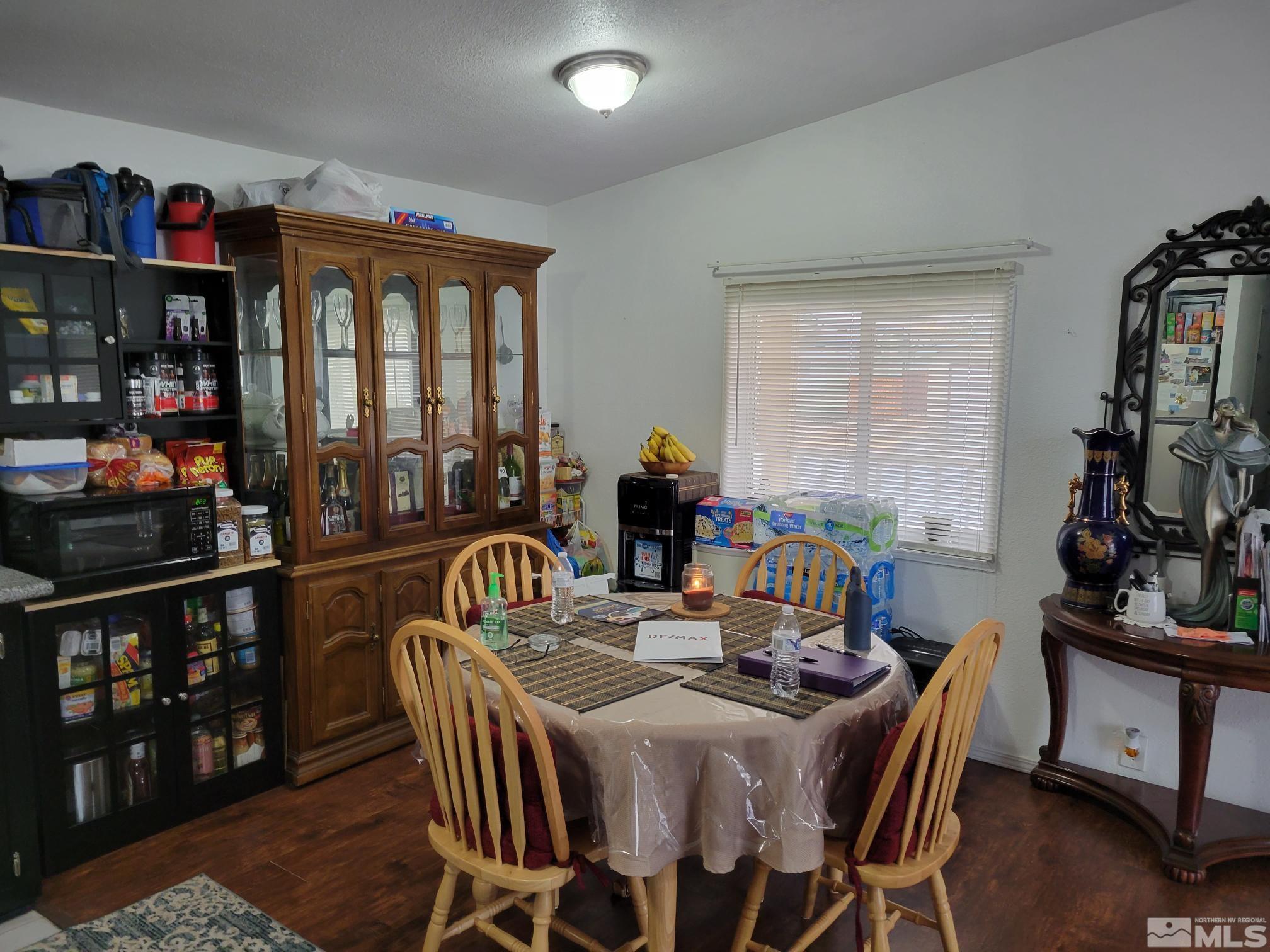 1348 Leopard Street Reno, NV 89506 - Photo 5 of 10 a view of a dining room with furniture window and outside view
