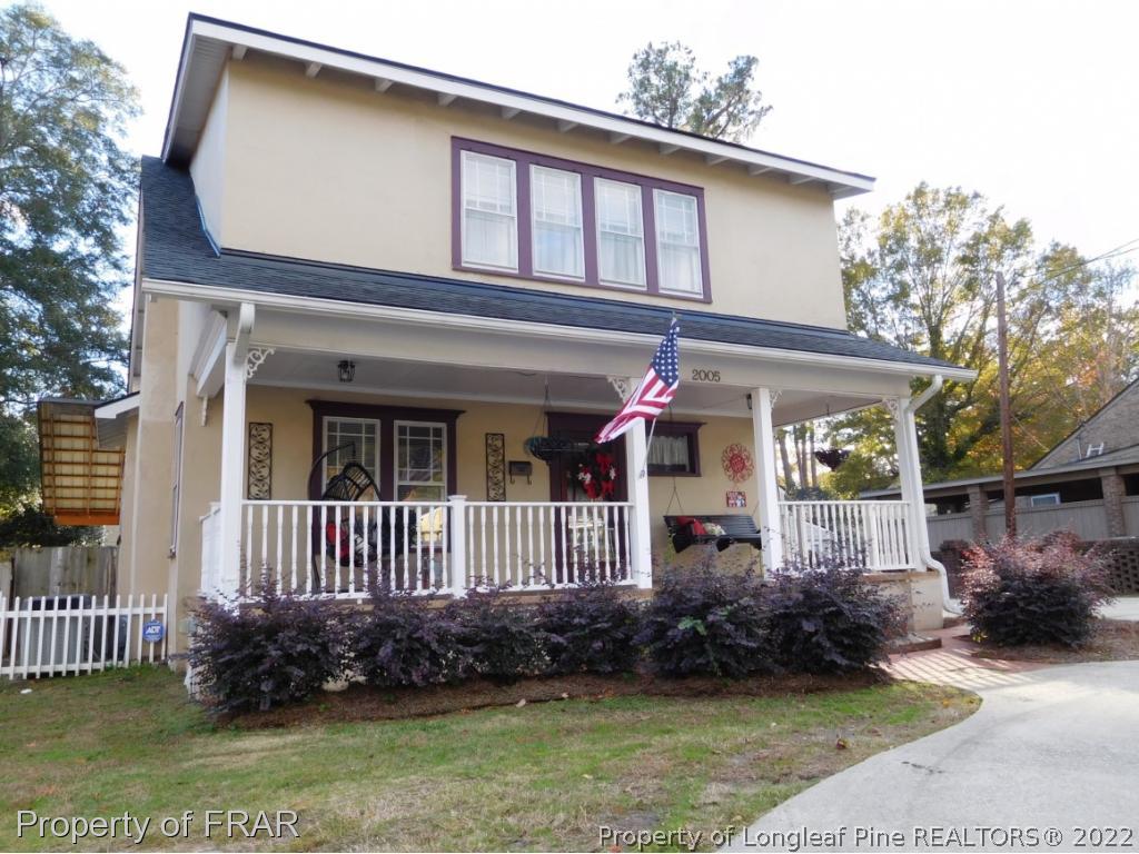 2005 Morganton Road Fayetteville, NC 28305 - Photo 1 of 35 a front view of a house with garden