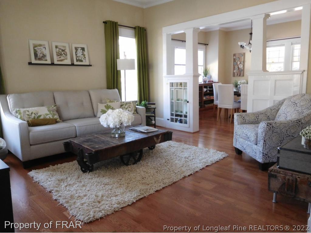 2005 Morganton Road Fayetteville, NC 28305 - Photo 4 of 35 a living room with furniture wooden floor and a table