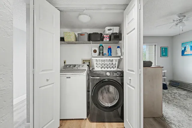 a storage room with washer and dryer