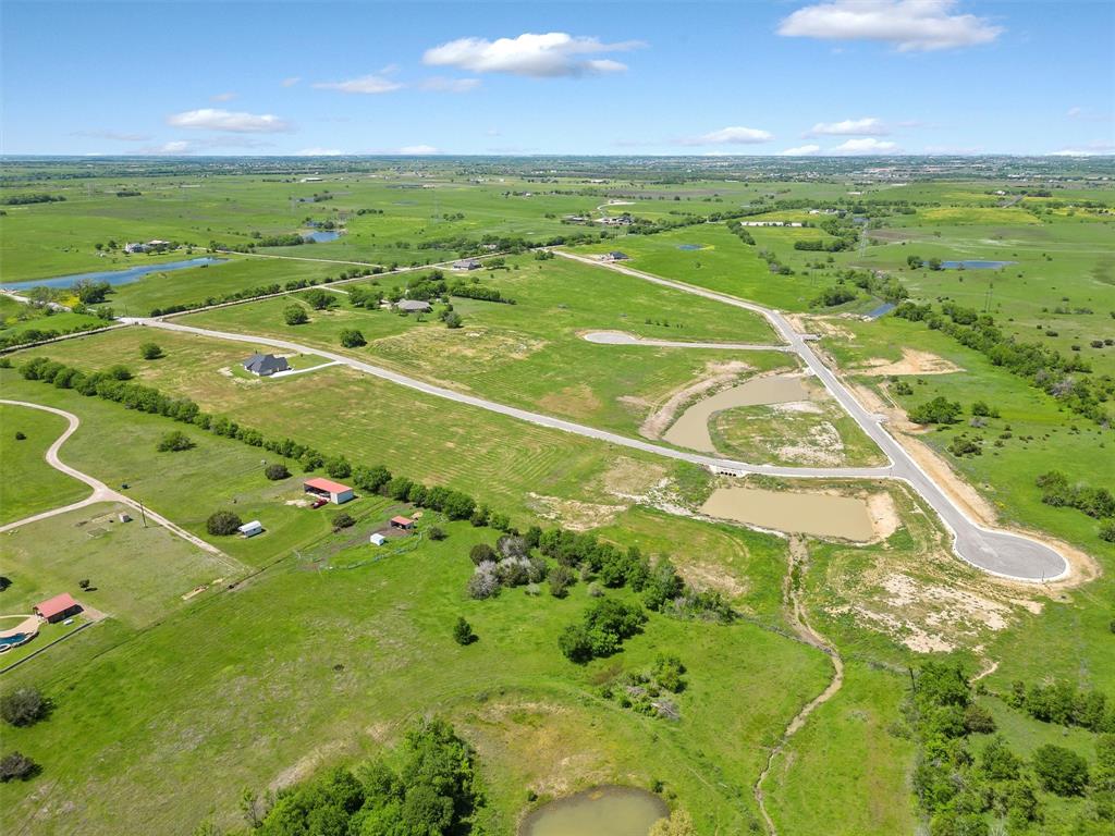 6408 Wind Hills Road Godley, TX 76044 - Photo 10 of 28 Drone / aerial view featuring a water view and a rural view