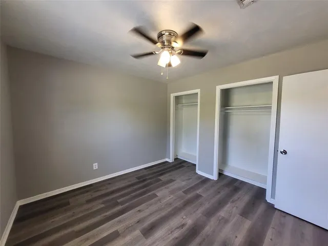 a bathroom with a toilet and a bathtub