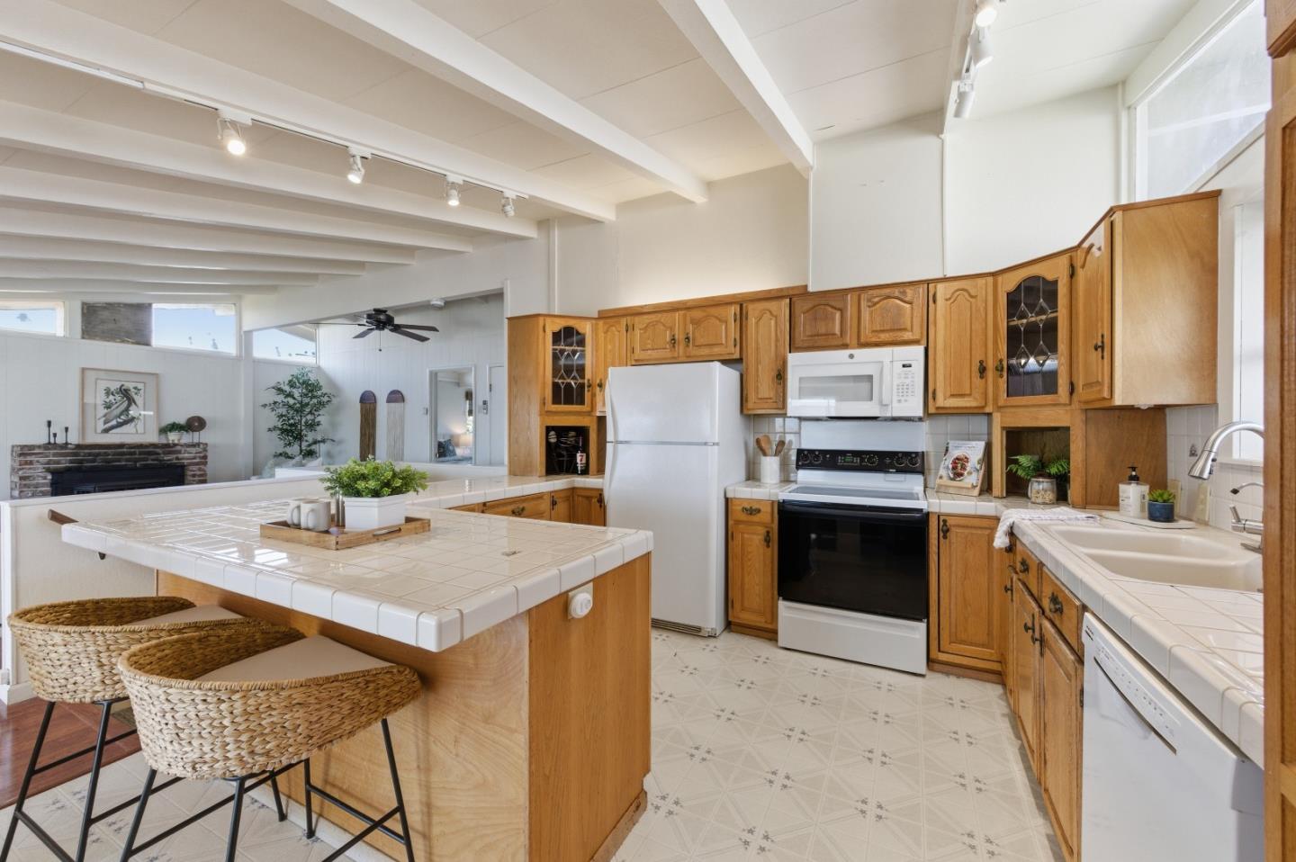 1856 Milton Road Napa, CA 94559 - Photo 13 of 47 a kitchen with stainless steel appliances granite countertop a stove refrigerator sink and cabinets