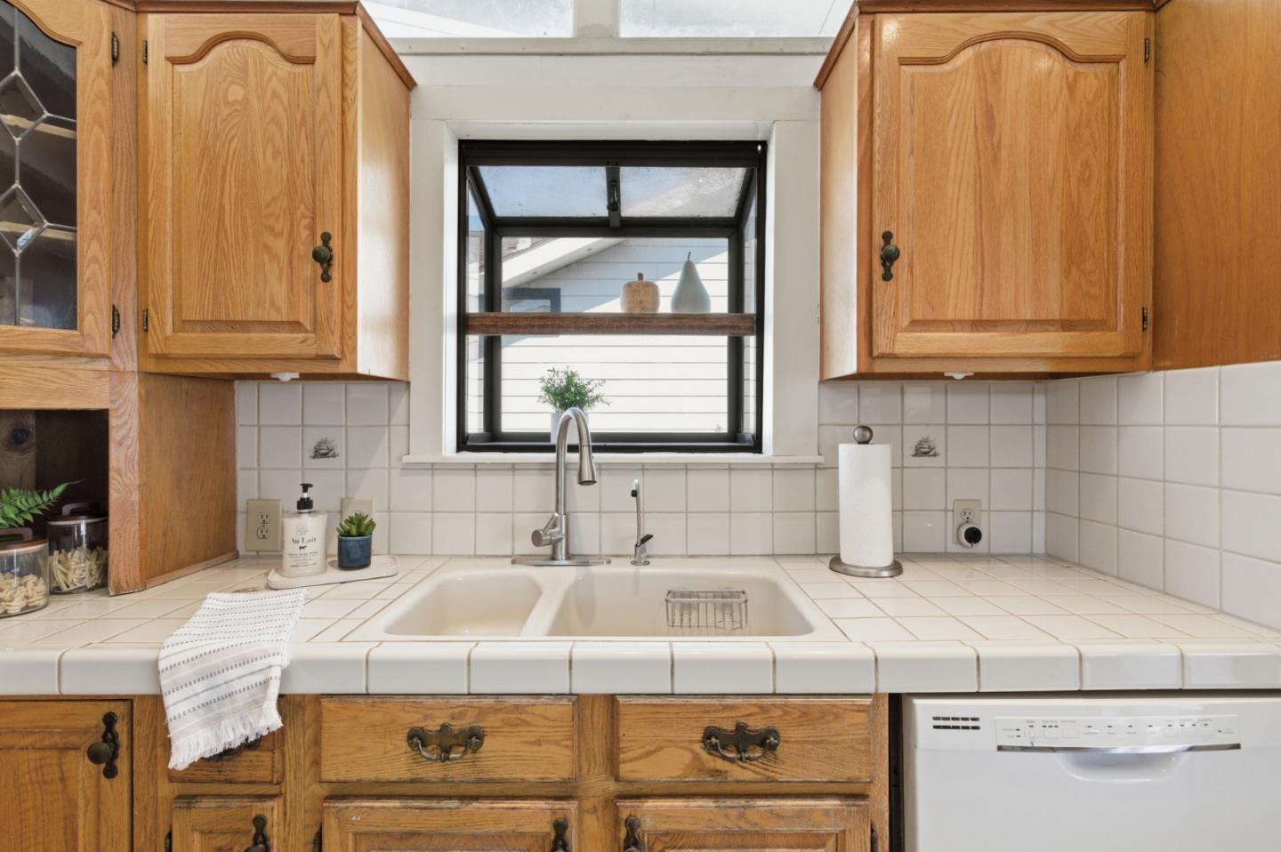 1856 Milton Road Napa, CA 94559 - Photo 14 of 47 a kitchen with a sink cabinets and a window