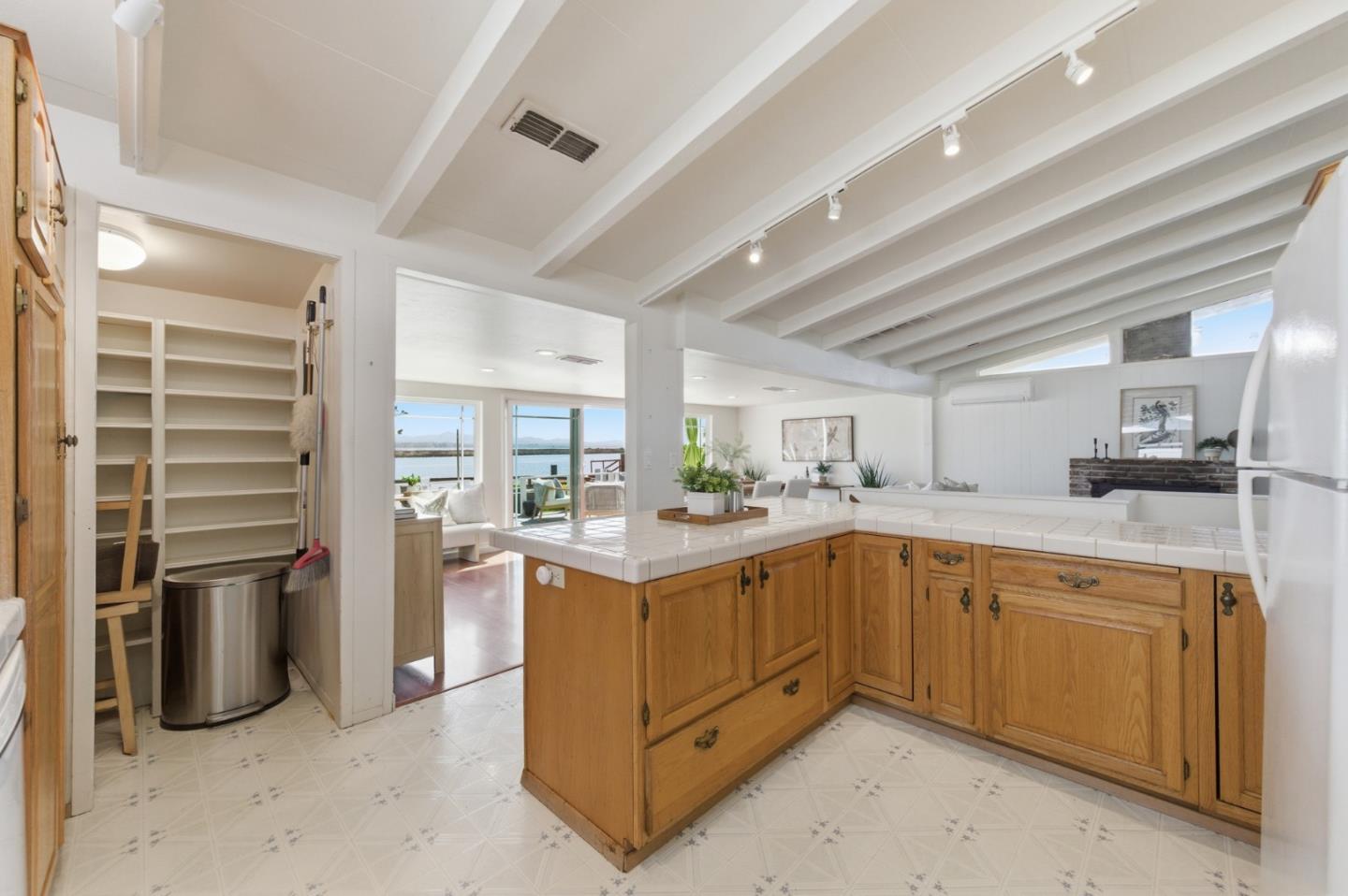 1856 Milton Road Napa, CA 94559 - Photo 15 of 47 a kitchen with cabinets and stainless steel appliances