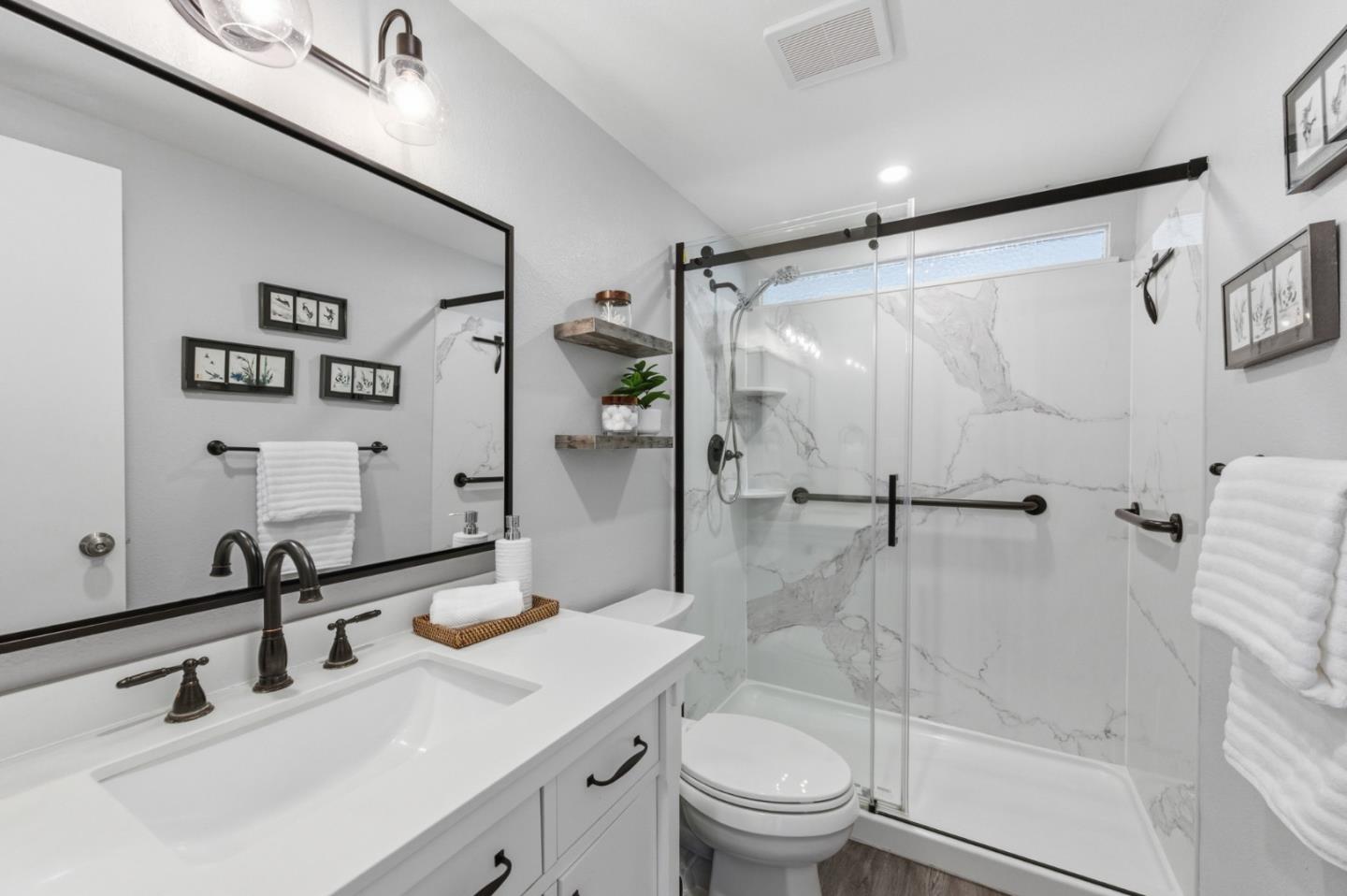 1856 Milton Road Napa, CA 94559 - Photo 25 of 47 a bathroom with a sink toilet and shower