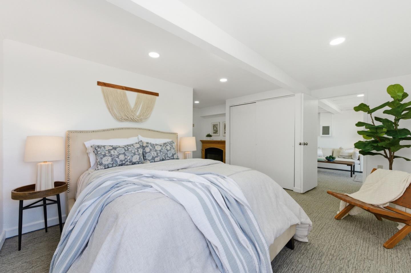 1856 Milton Road Napa, CA 94559 - Photo 40 of 47 a spacious bedroom with a bed and a potted plant