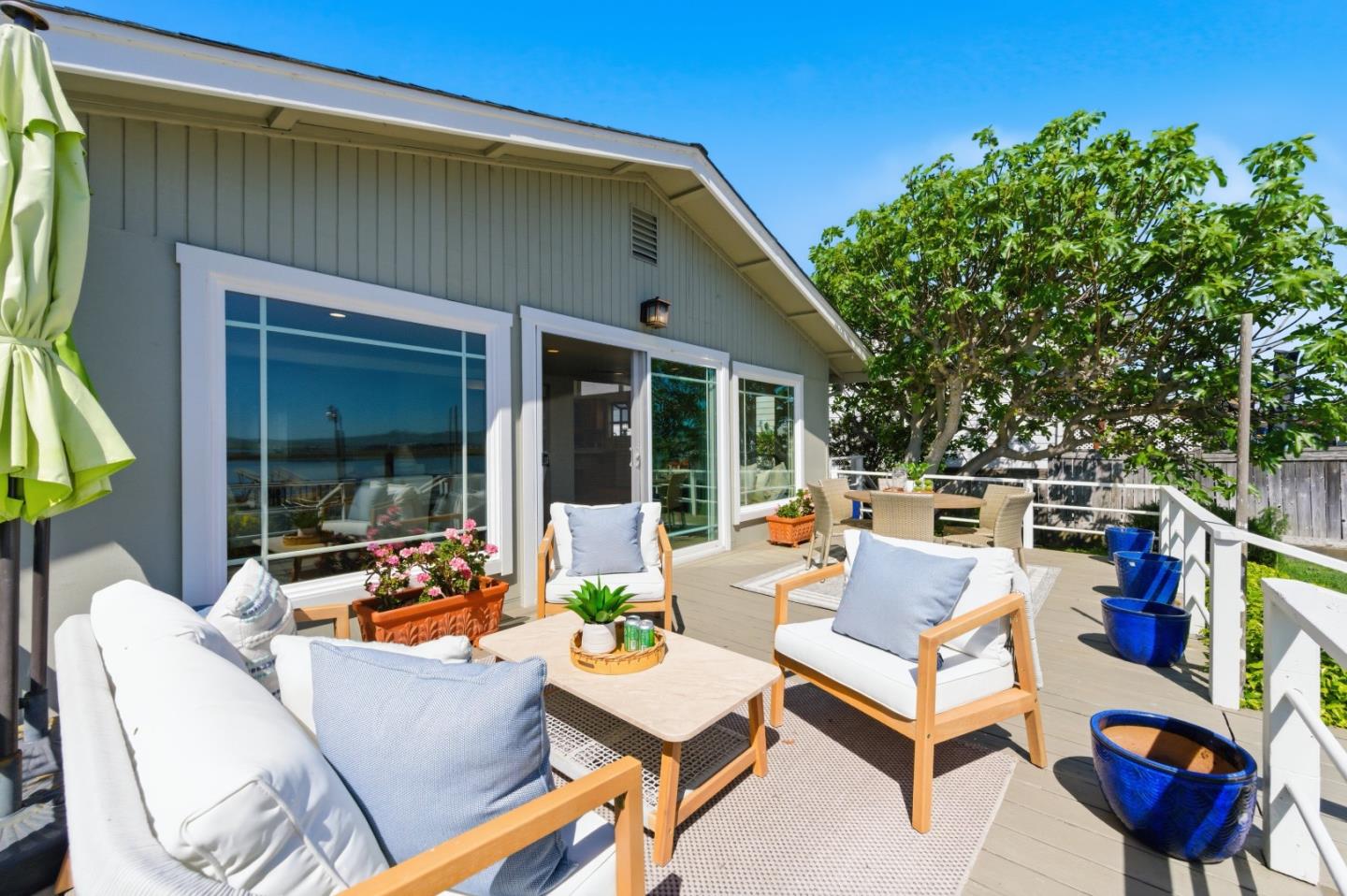 1856 Milton Road Napa, CA 94559 - Photo 4 of 47 a view of a patio with couches table and chairs and potted plants