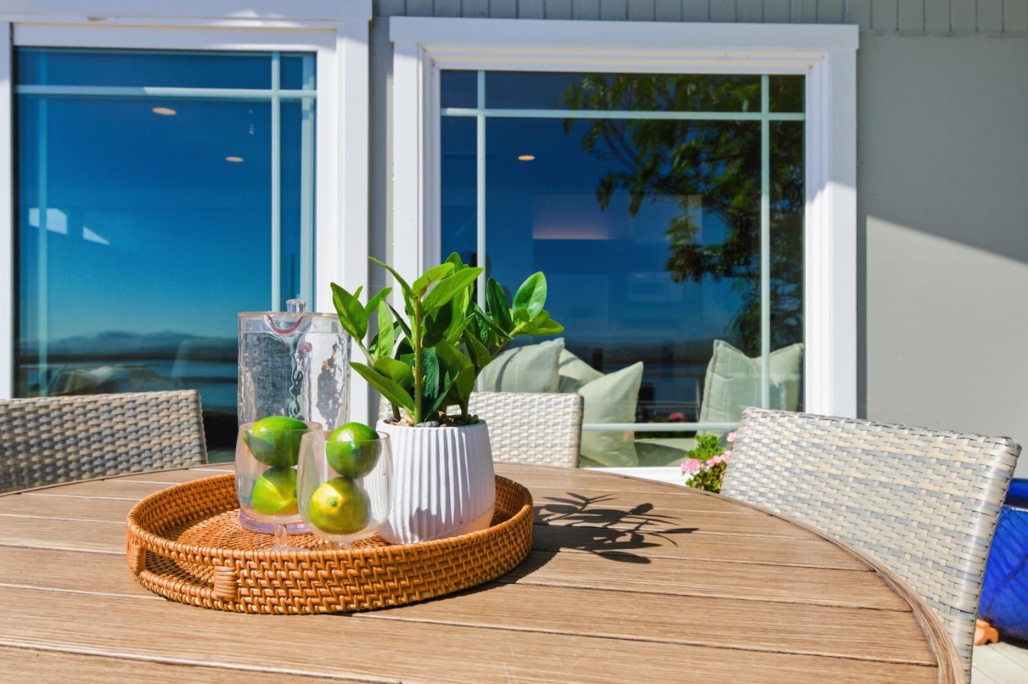 1856 Milton Road Napa, CA 94559 - Photo 5 of 47 a vase of flowers sitting on a dining table with a potted plant
