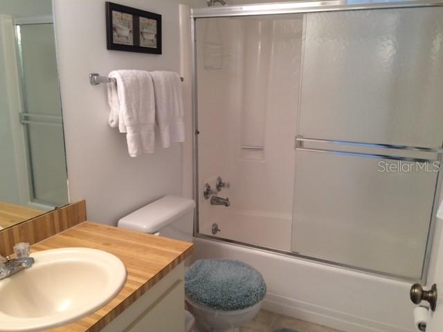 16881 Davis Road, Unit 723 Fort Myers, FL 33908 - Photo 11 of 13 a bathroom with a sink and a mirror