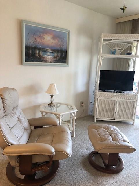 16881 Davis Road, Unit 723 Fort Myers, FL 33908 - Photo 7 of 13 a living room with furniture and a couch