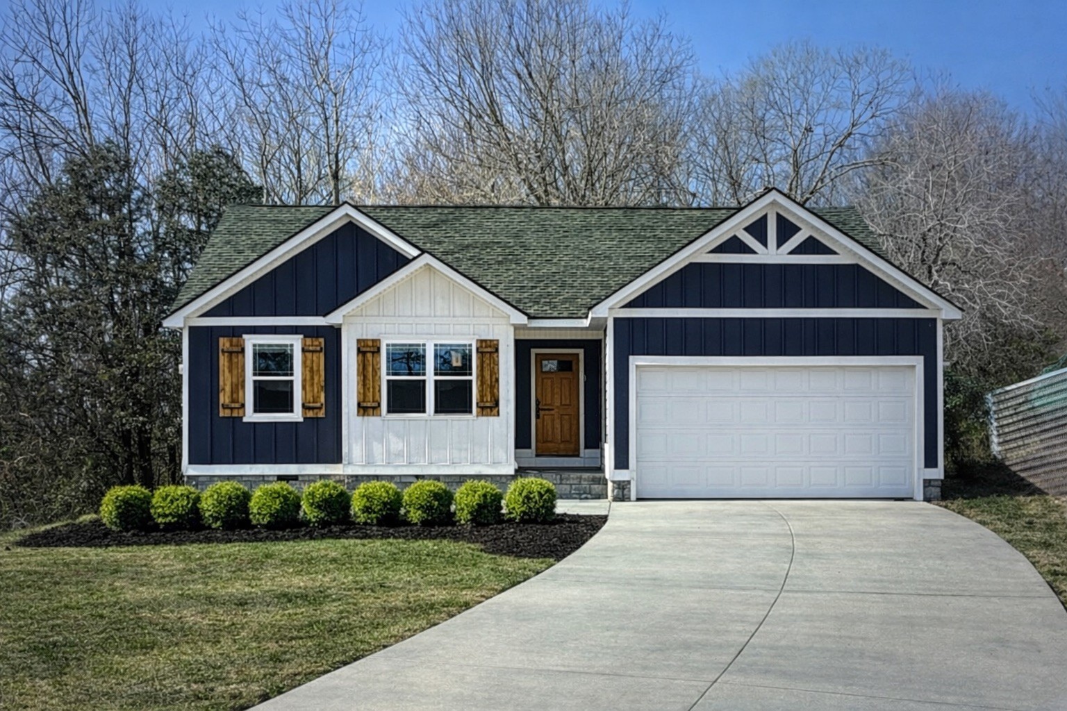504 Mandalorian Way Dickson, TN 37055 - Photo 1 of 3 a front view of a house with a yard and garage