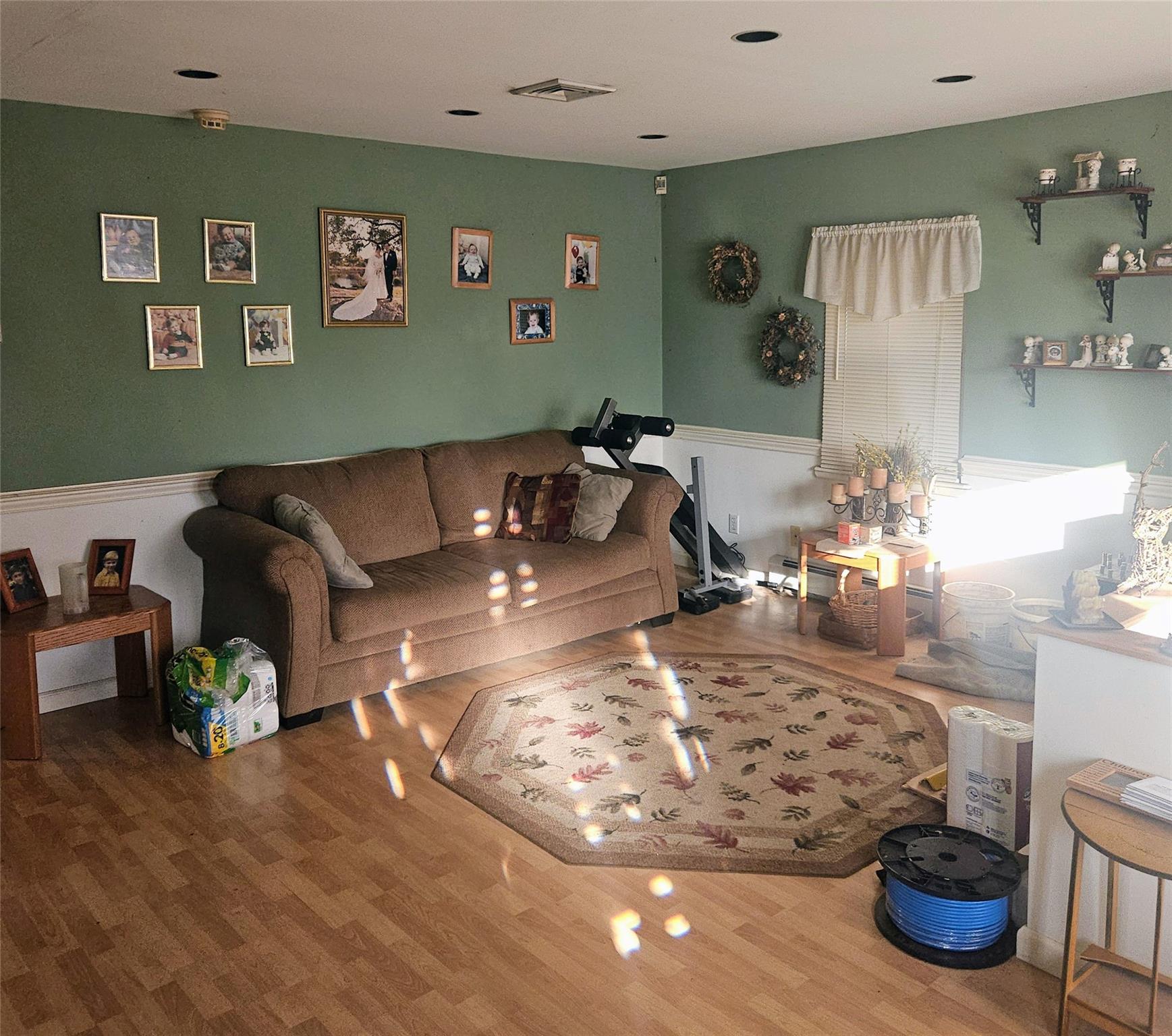 623 Willow Street Mamaroneck, NY 10543 - Photo 2 of 3 Living room with visible vents and wood finished floors