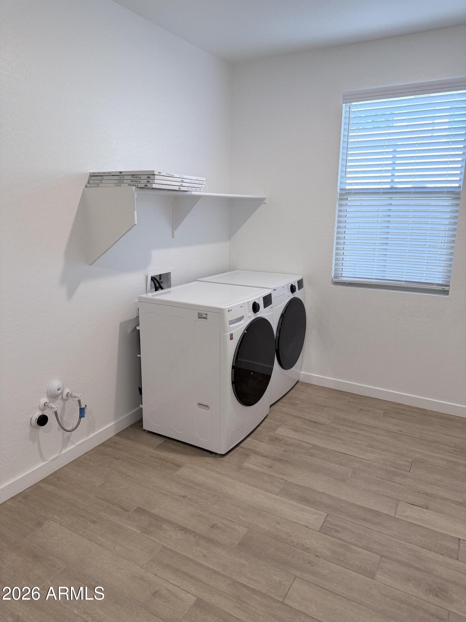 4323 West Palace Sta Road New River, AZ 85087 - Photo 18 of 20 a utility room with washer and dryer