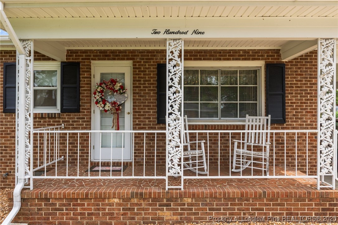 209 4th Street Erwin, NC 28339 - Photo 2 of 43 a view of a building with a window