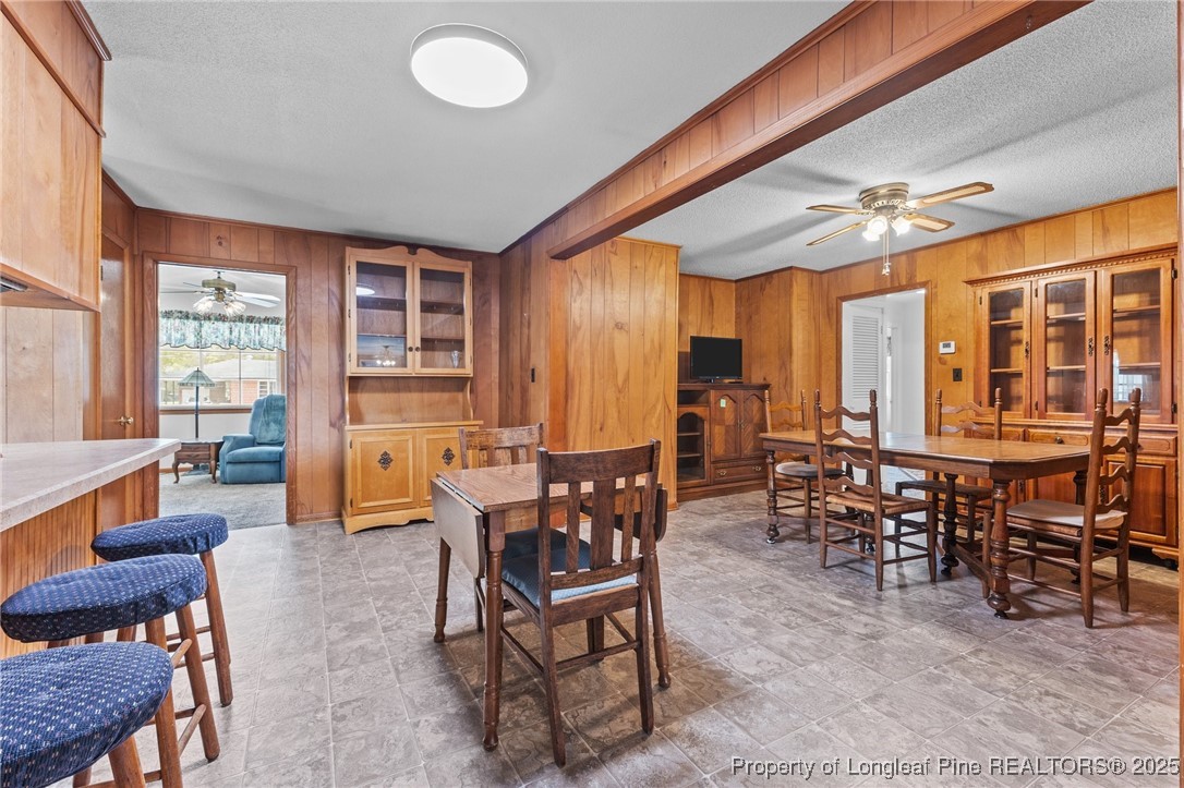 209 4th Street Erwin, NC 28339 - Photo 23 of 43 a view of a dining room with furniture window and outside view