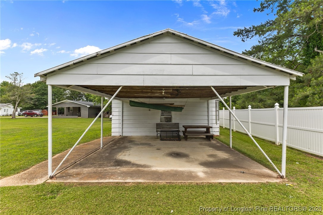 209 4th Street Erwin, NC 28339 - Photo 35 of 43 a view of a house with backyard