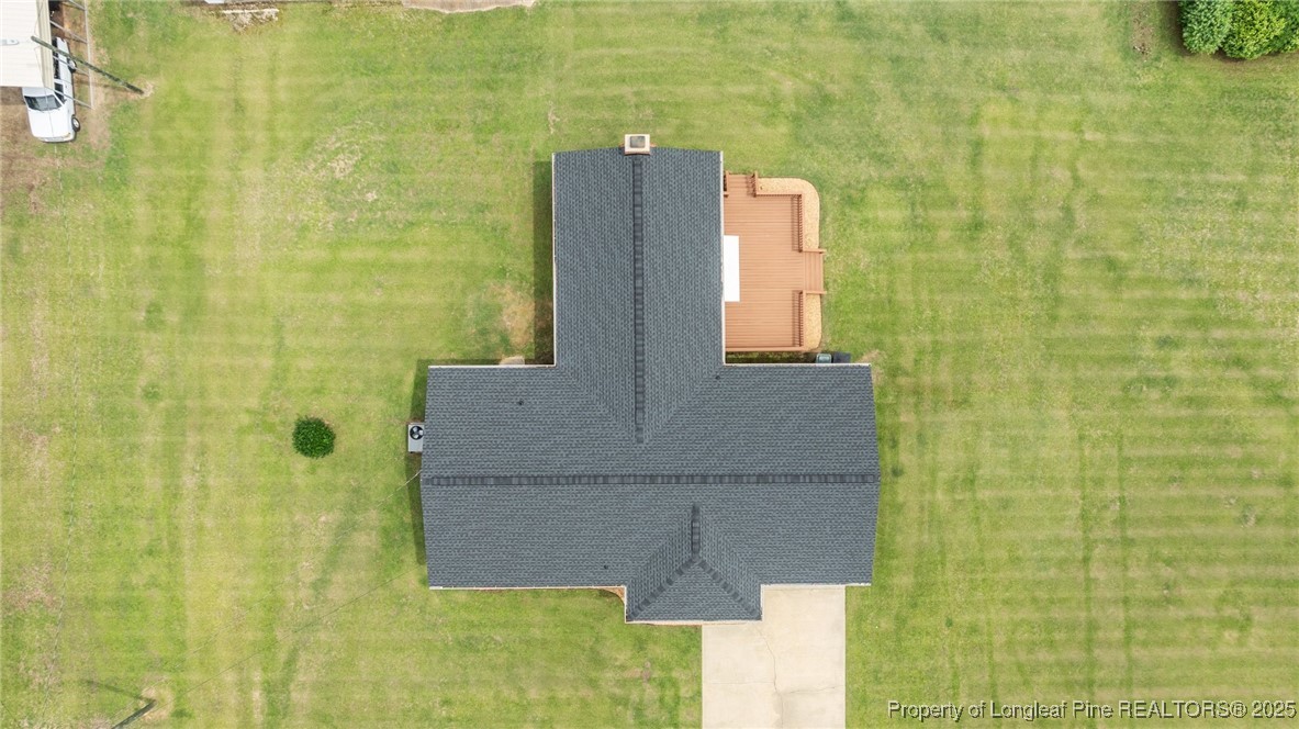 209 4th Street Erwin, NC 28339 - Photo 38 of 43 a bathroom with a shower