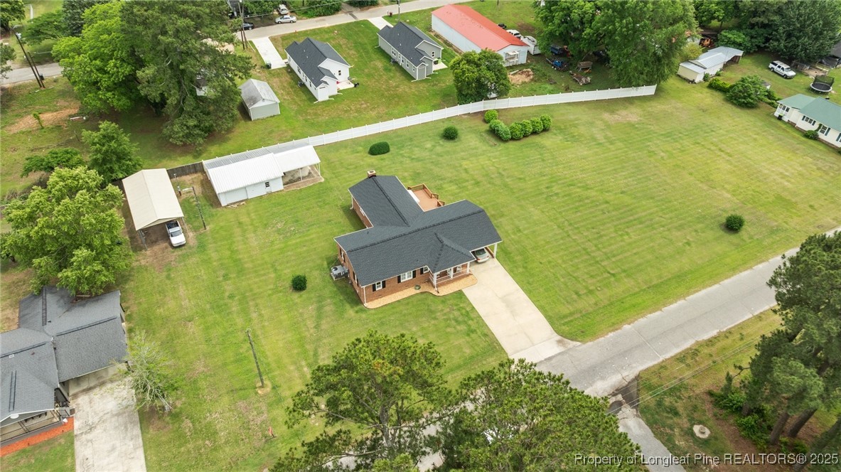 209 4th Street Erwin, NC 28339 - Photo 4 of 43 an aerial view of a residential houses with outdoor space and street view