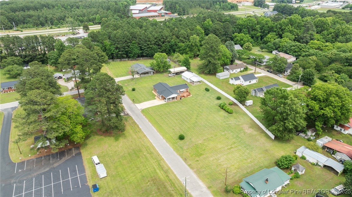 209 4th Street Erwin, NC 28339 - Photo 41 of 43 a view of a swimming pool with a yard