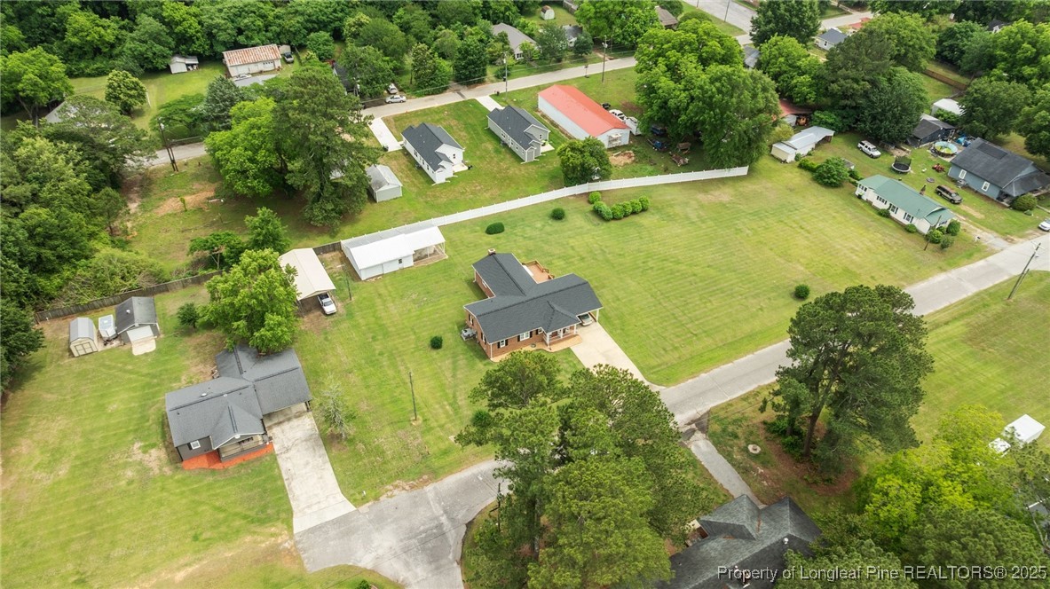 209 4th Street Erwin, NC 28339 - Photo 42 of 43 an aerial view of a residential houses with outdoor space