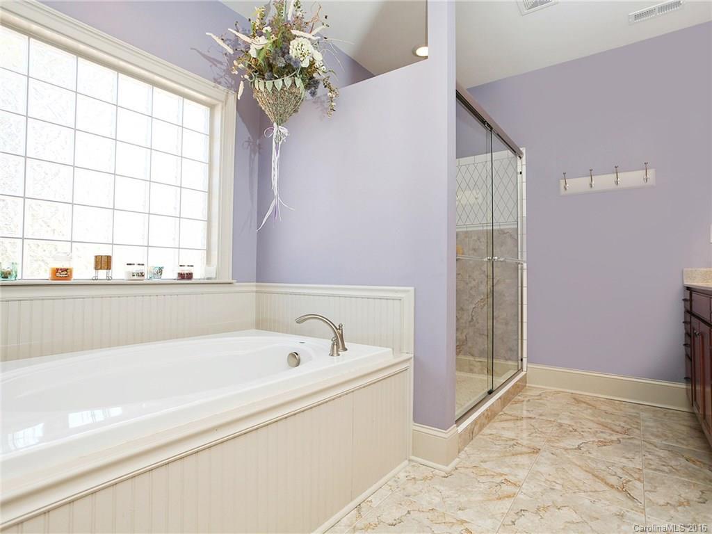 3457 Harmony Road Catawba, SC 29704 - Photo 12 of 24 a bathroom with a bathtub and shower