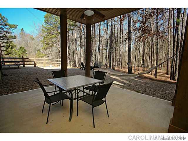 3457 Harmony Road Catawba, SC 29704 - Photo 23 of 24 a dining room with furniture and a floor to ceiling window