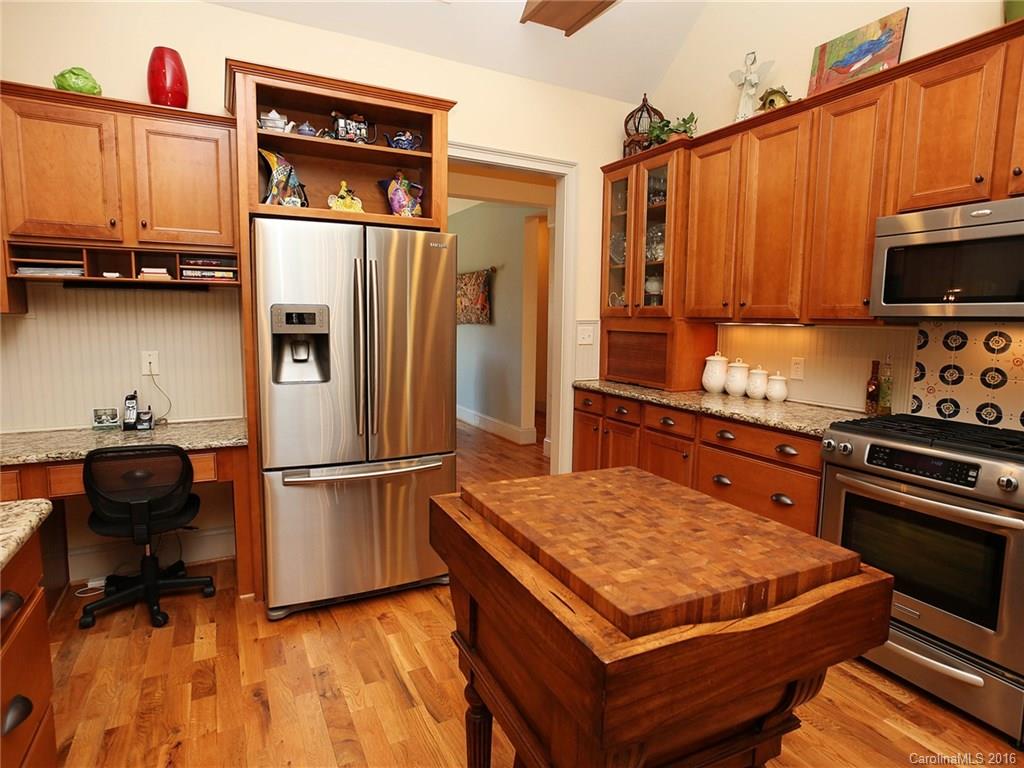 3457 Harmony Road Catawba, SC 29704 - Photo 8 of 24 a kitchen with stainless steel appliances granite countertop a refrigerator stove and sink