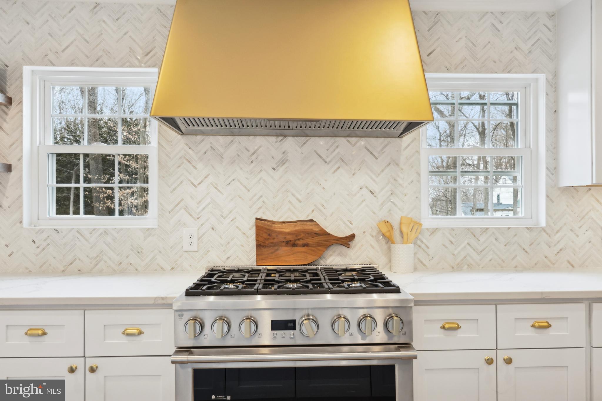 827 Weadley Road Wayne, PA 19087 - Photo 14 of 96 a stove top oven sitting inside of a kitchen