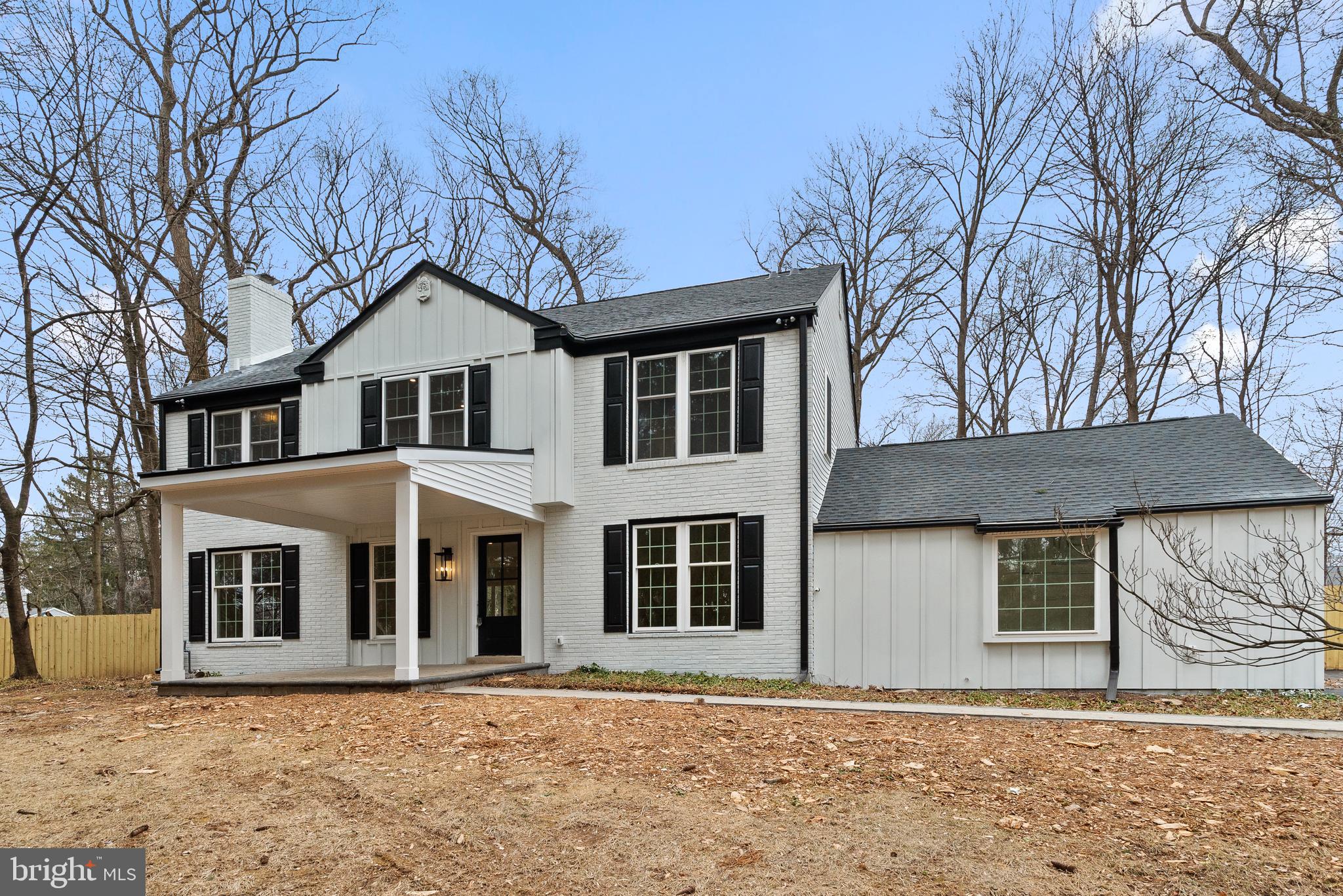 827 Weadley Road Wayne, PA 19087 - Photo 2 of 96 a front view of a house with a yard