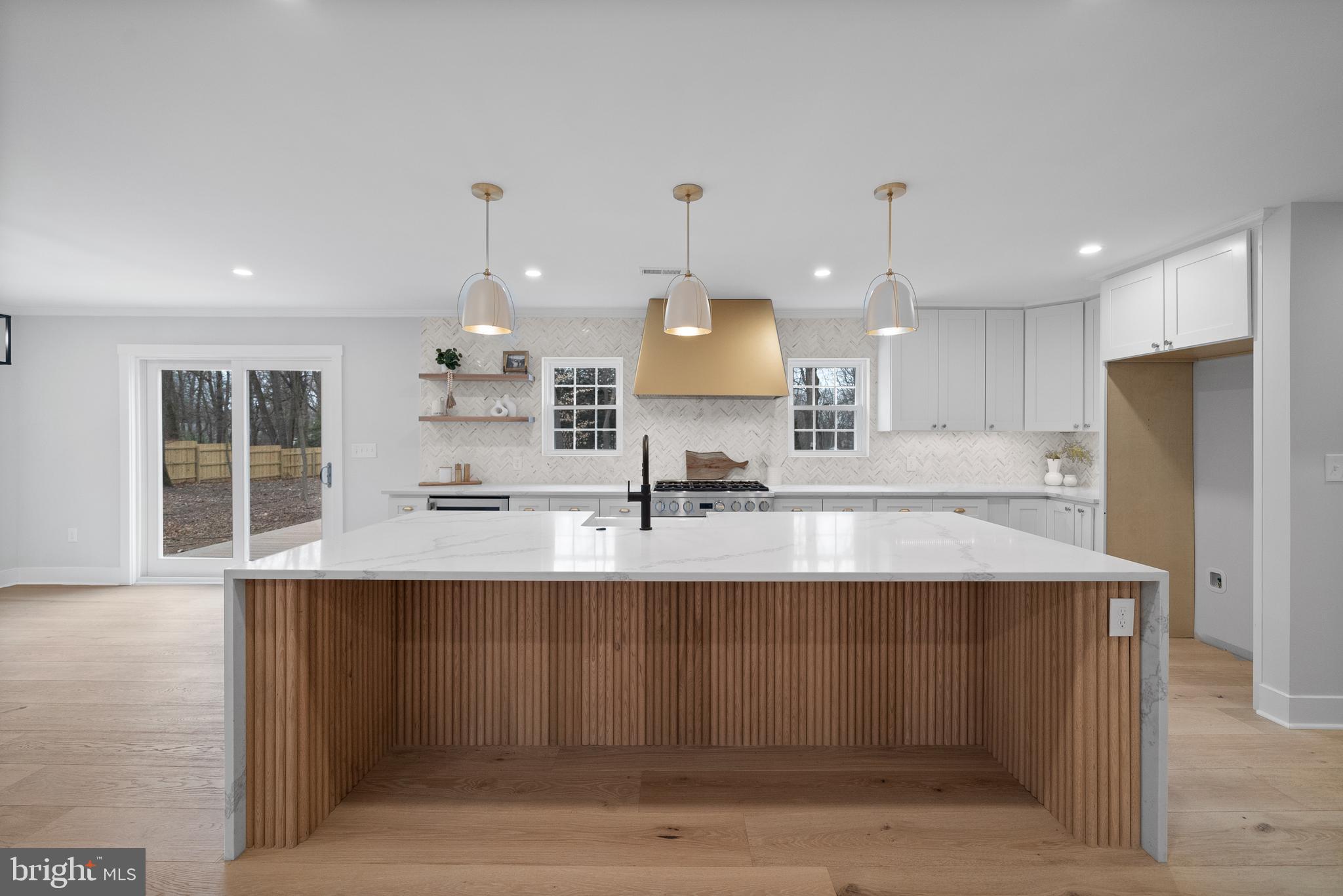827 Weadley Road Wayne, PA 19087 - Photo 24 of 96 a large kitchen with kitchen island a sink stainless steel appliances and cabinets