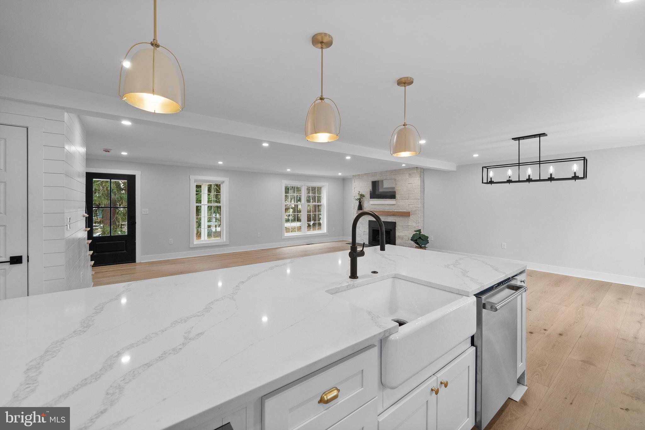 827 Weadley Road Wayne, PA 19087 - Photo 32 of 96 a kitchen with a sink and chandelier