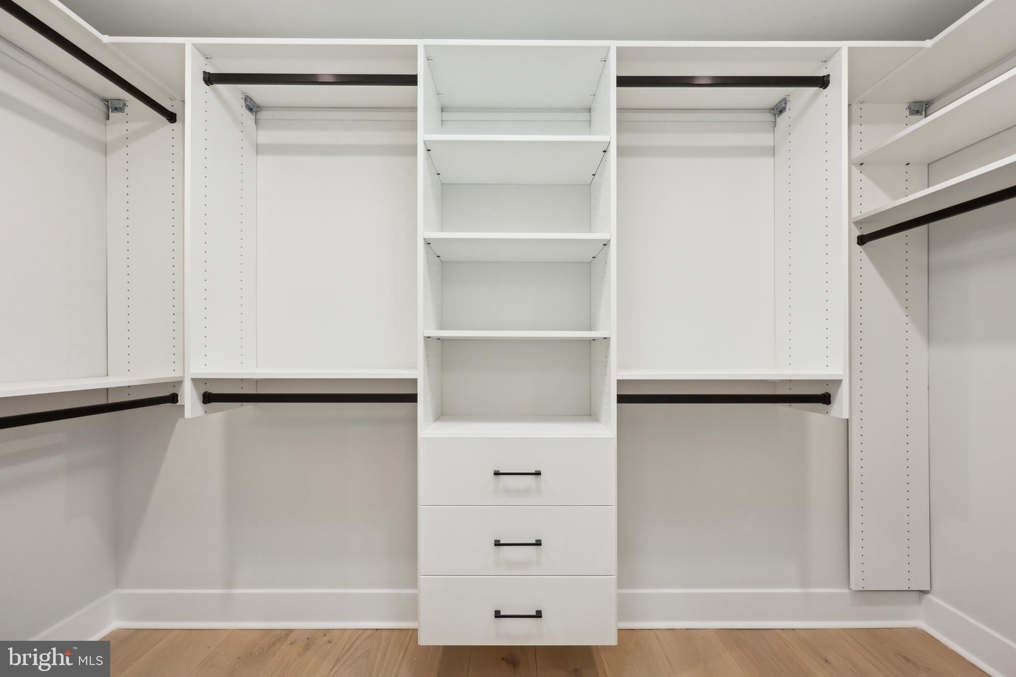 827 Weadley Road Wayne, PA 19087 - Photo 47 of 96 a view of walk in closet with empty racks