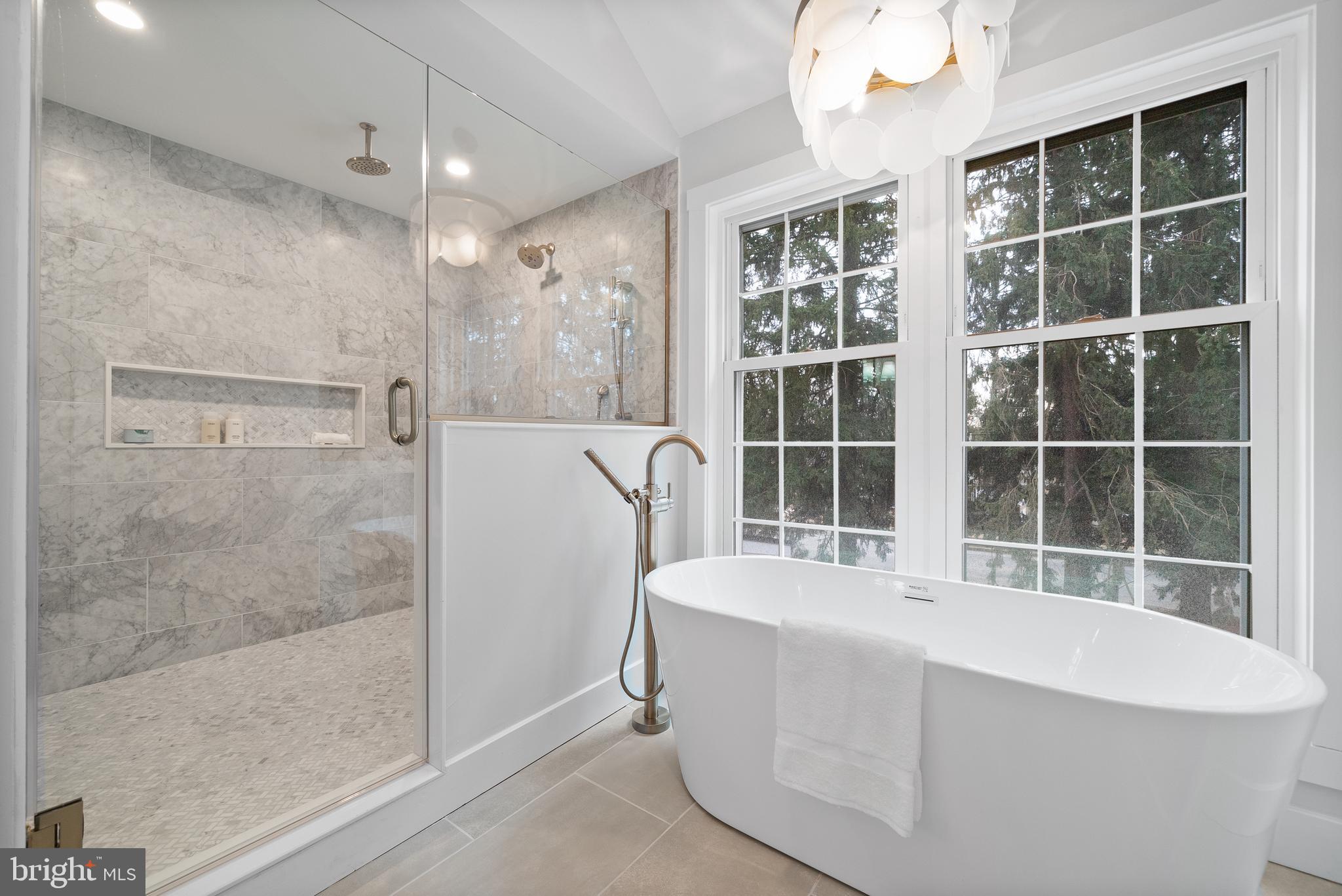 827 Weadley Road Wayne, PA 19087 - Photo 91 of 96 a large white tub sitting next to a window