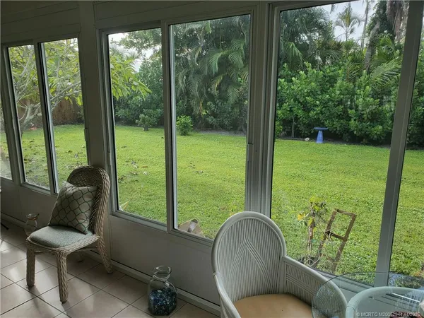 a bedroom with a bed furniture and a window