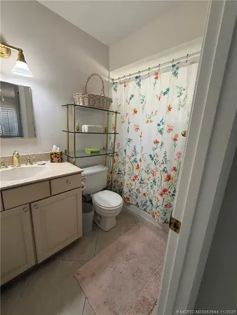 a bathroom with a sink and toilet