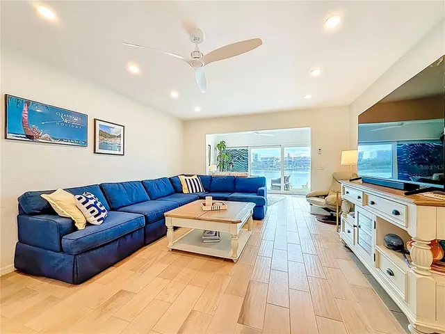 a view of a dining area with furniture and a mirror