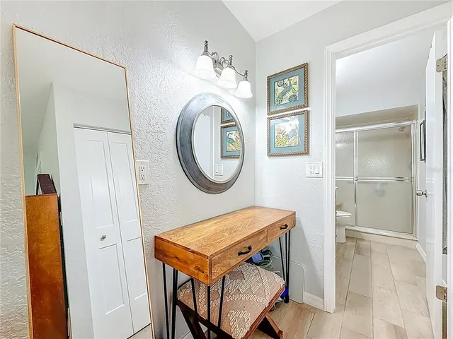 an aerial view of a house with a table and chairs
