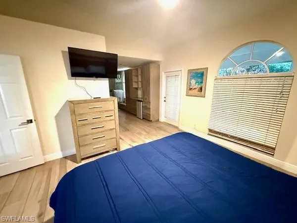 a view of livingroom with furniture and flat screen tv