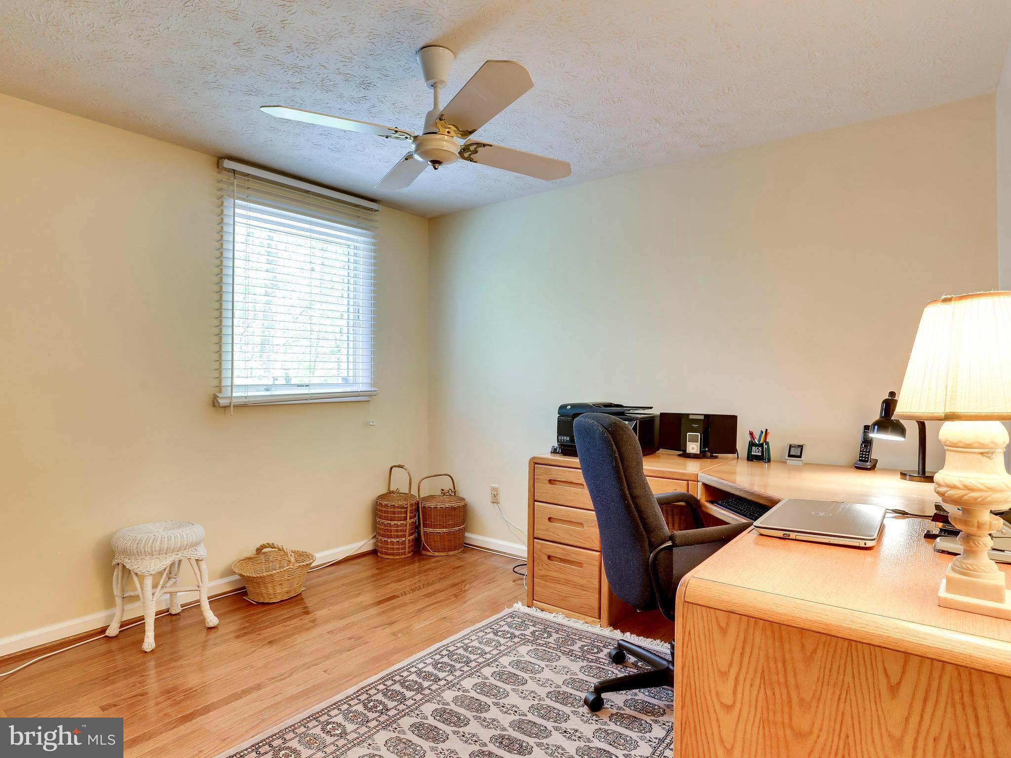 7569 Vogels Way Springfield, VA 22153 - Photo 21 of 28 a room with a workspace