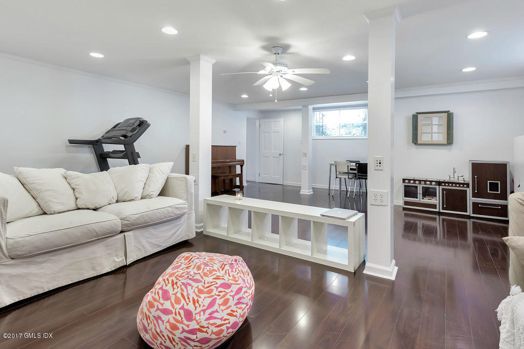 29 Long Meadow Road Riverside, CT 06878 - Photo 17 of 26 a living room with furniture and wooden floor