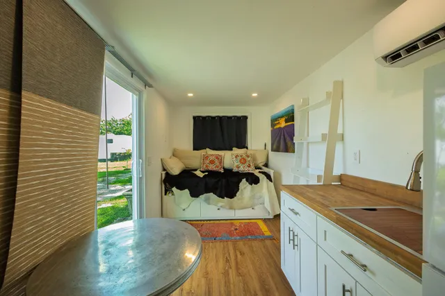 a view of a living room and a kitchen
