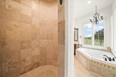 a view of empty room with a ceiling fan