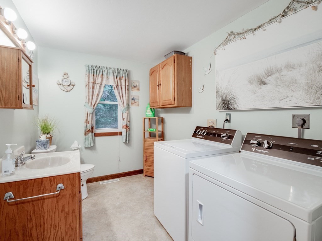 145 Coburn Road Tyngsborough, MA 01879 - Photo 19 of 41 a room with storage and utility