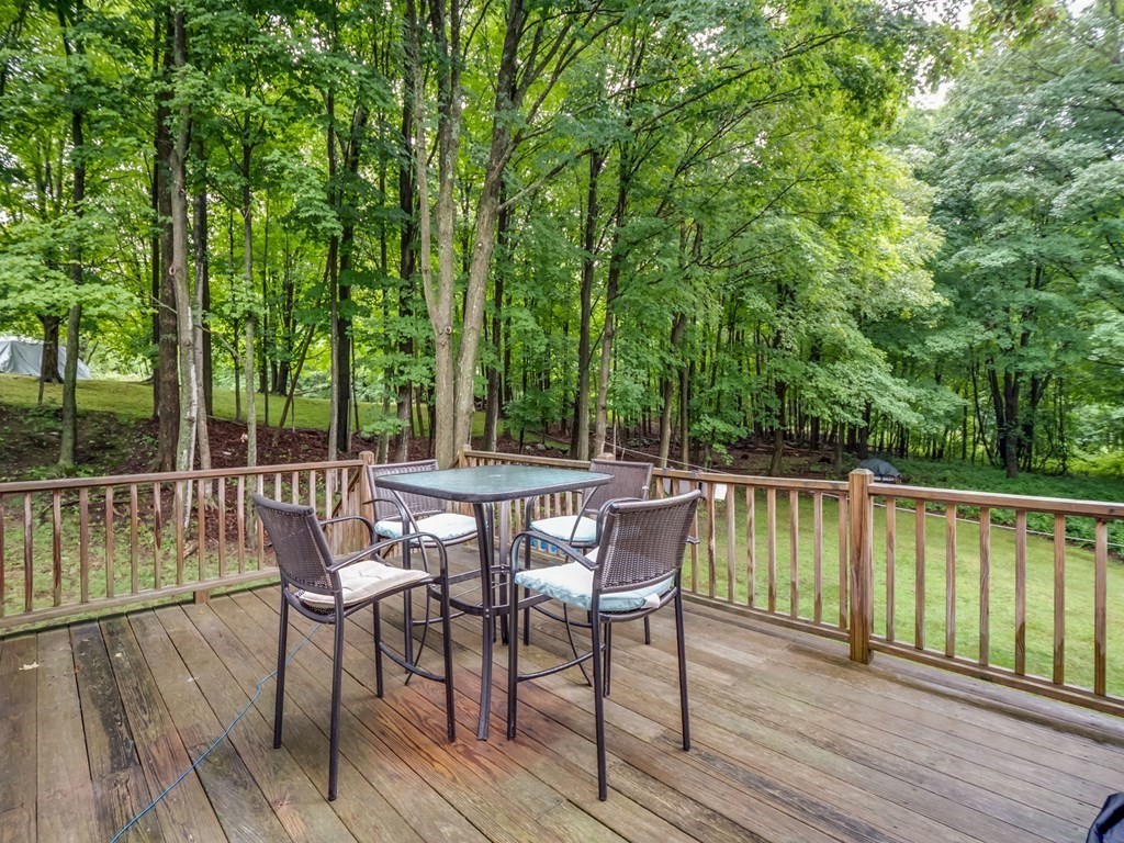 145 Coburn Road Tyngsborough, MA 01879 - Photo 38 of 41 a view of backyard with a deck and hardwood floor