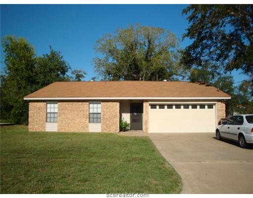1220 Burt Street Bryan, TX 77803 - Photo 1 of 1 a view of house with outdoor space and parking
