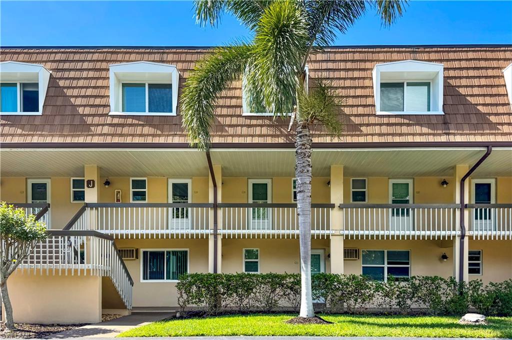 87 North Collier Boulevard, Unit J18 Marco Island, FL 34145 - Photo 2 of 21 Entrance on 2nd floor